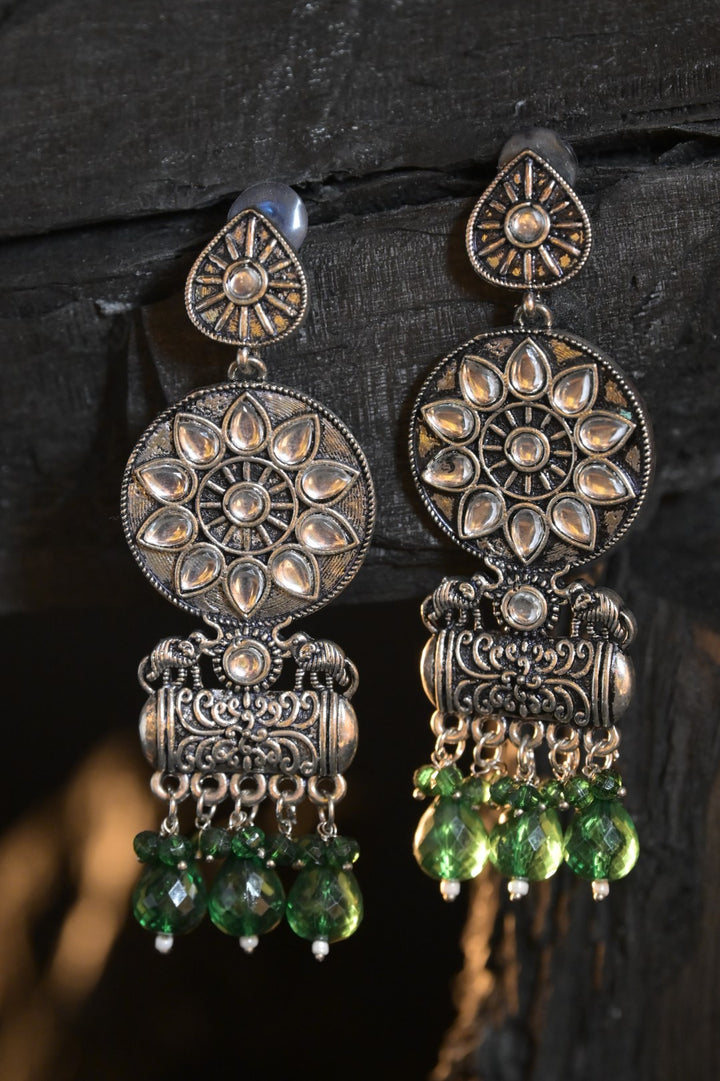 Shaily Gemstone Tassel Silver Jhumka Earrings